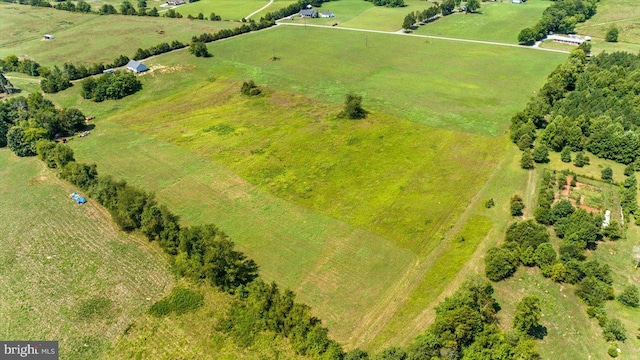 birds eye view of property featuring a rural view