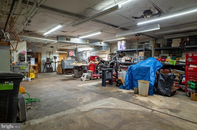 garage with a workshop area