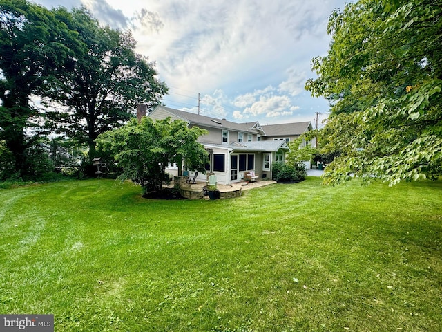 view of yard with a patio area