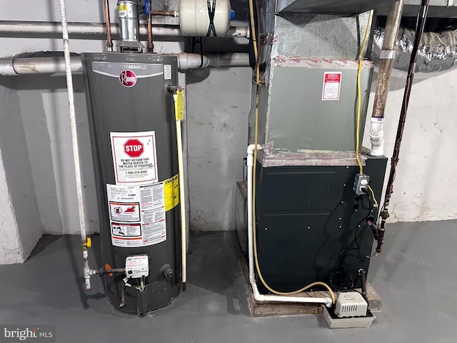 utility room with gas water heater