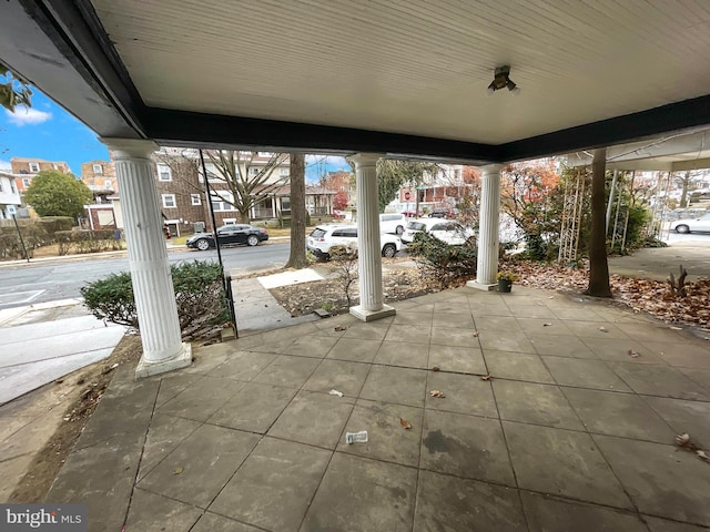 view of patio featuring a porch