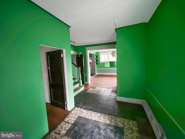 hallway with a baseboard radiator