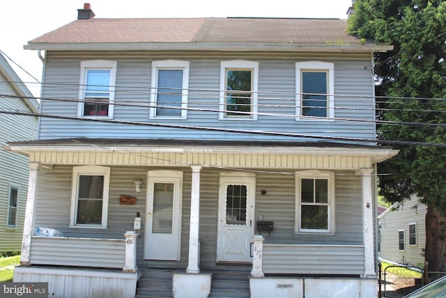 view of front of home featuring covered porch