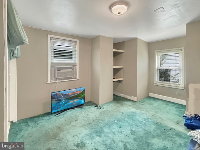 unfurnished bedroom with light colored carpet