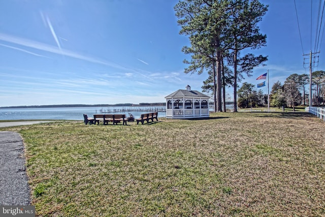 view of yard with a water view and a gazebo