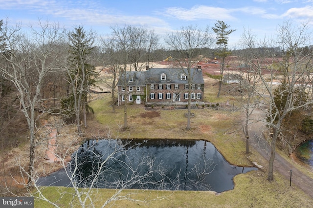 drone / aerial view with a water view