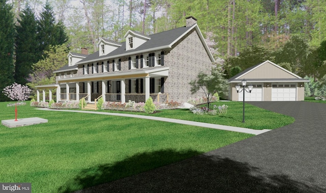 view of front of property featuring a garage, an outbuilding, a front yard, and covered porch