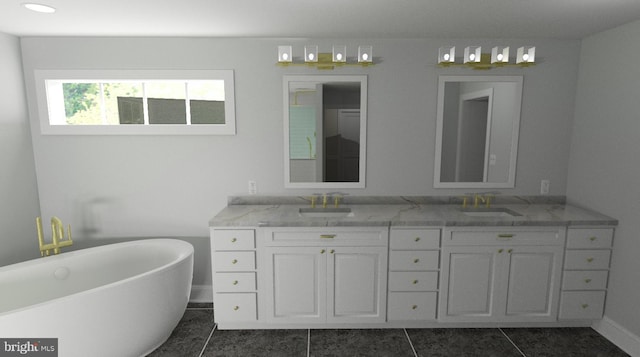 bathroom with vanity, tile patterned flooring, and a washtub