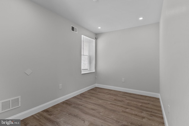 empty room featuring hardwood / wood-style floors