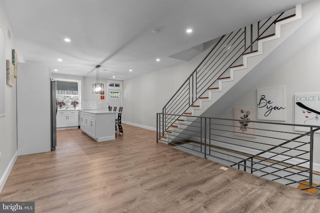 interior space with hardwood / wood-style flooring