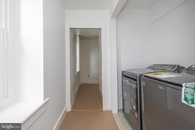 laundry area with washer and clothes dryer