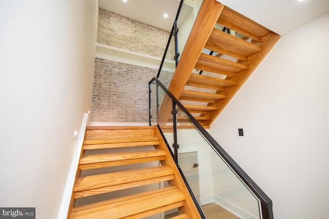 stairway with brick wall