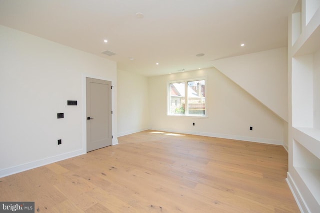 bonus room featuring light hardwood / wood-style floors