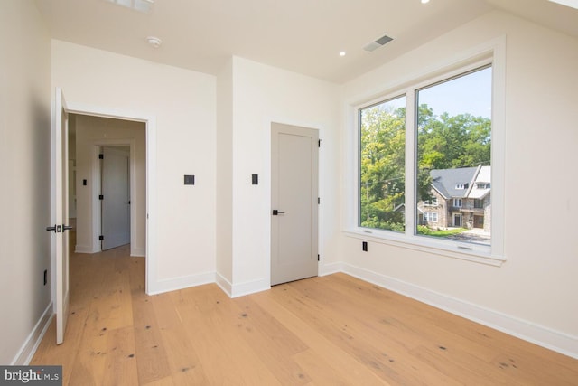 unfurnished bedroom featuring light hardwood / wood-style flooring