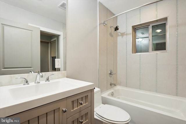 full bathroom featuring vanity, toilet, and washtub / shower combination