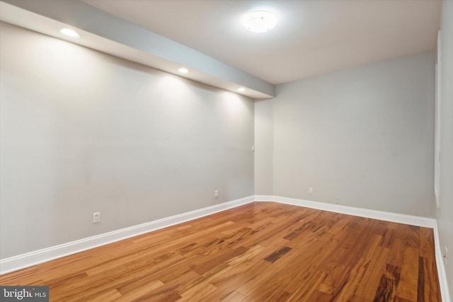 basement with wood-type flooring