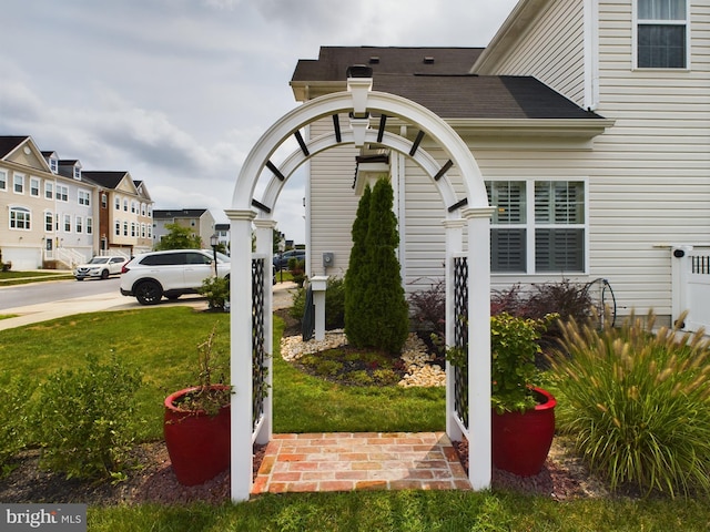 entrance to property with a yard