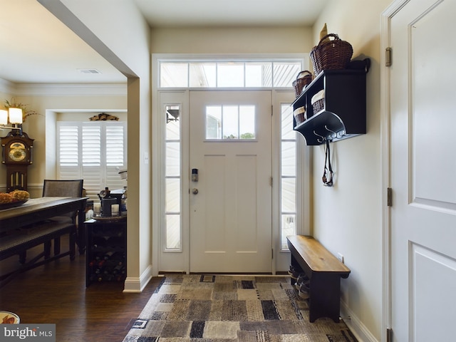 foyer featuring dark hardwood / wood-style floors