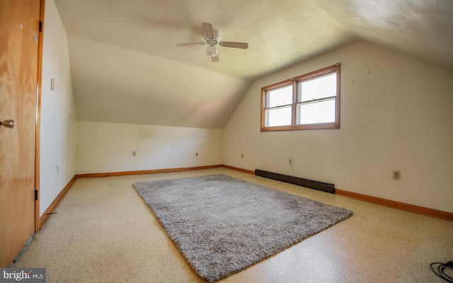 bonus room with ceiling fan, light carpet, vaulted ceiling, and baseboard heating