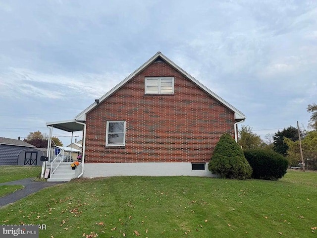 view of home's exterior featuring a yard