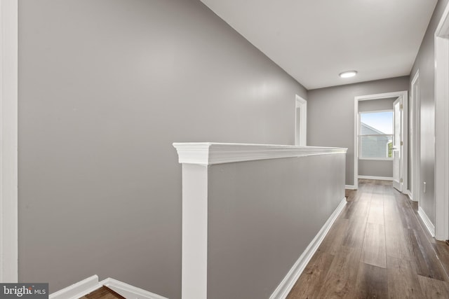 corridor with dark wood-type flooring