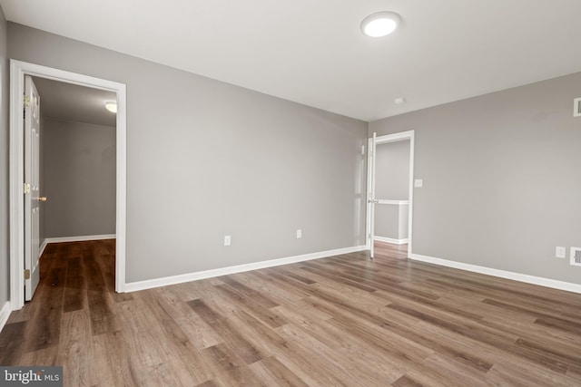 unfurnished bedroom with light hardwood / wood-style floors