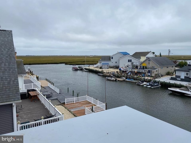 dock area featuring a water view