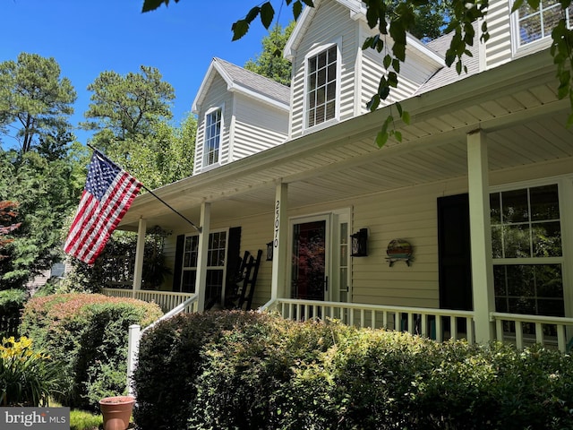 doorway to property with a porch