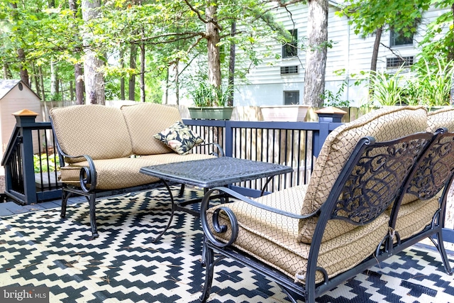 deck with an outdoor hangout area