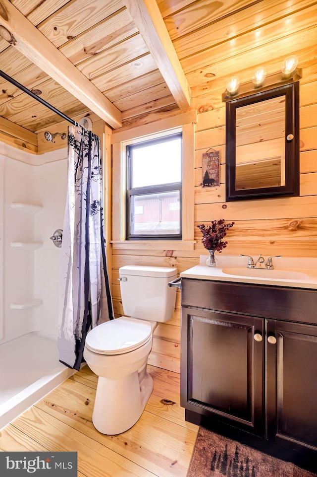 full bath with a stall shower, wood ceiling, beamed ceiling, and wooden walls