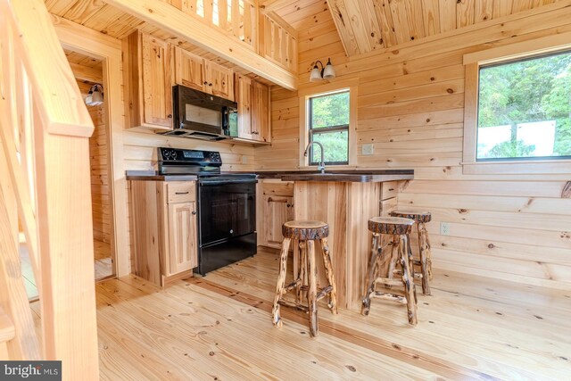 unfurnished bedroom with wooden walls, wooden ceiling, vaulted ceiling with beams, an AC wall unit, and light wood-type flooring