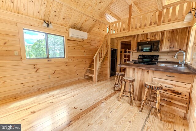 bedroom featuring vaulted ceiling with beams, an AC wall unit, light wood-type flooring, and wooden walls