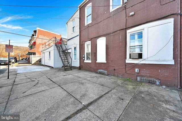 view of home's exterior featuring a patio area