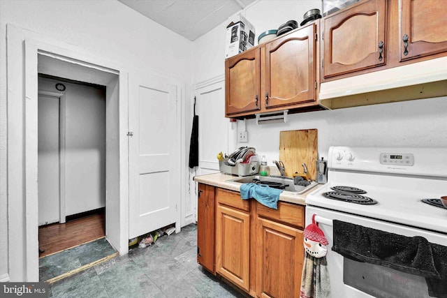 kitchen with sink and white electric stove