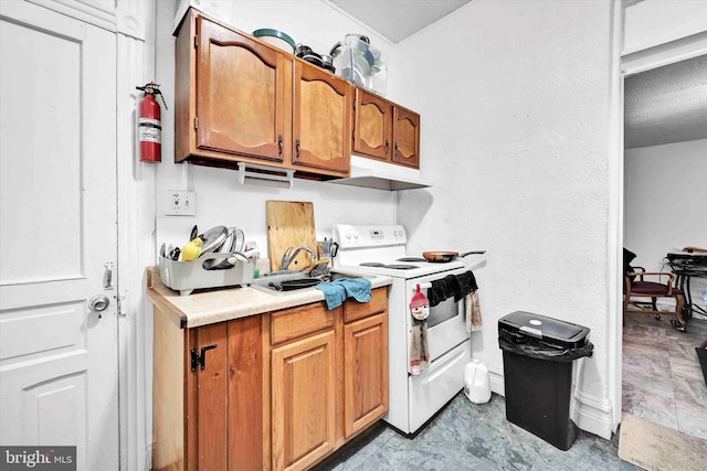 kitchen with white electric range