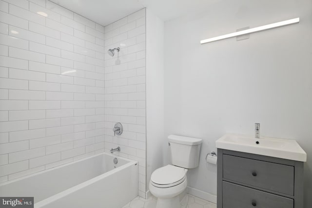 full bathroom featuring vanity, toilet, tiled shower / bath, and tile patterned flooring