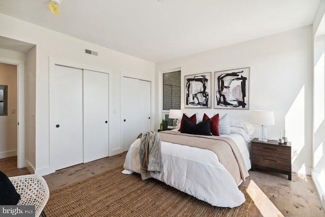 bedroom featuring hardwood / wood-style floors