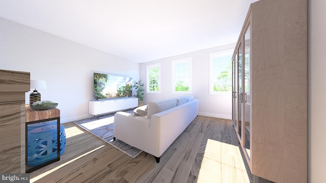 living room featuring hardwood / wood-style floors and lofted ceiling