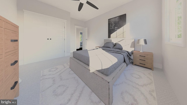 carpeted bedroom featuring ceiling fan, multiple windows, and a closet