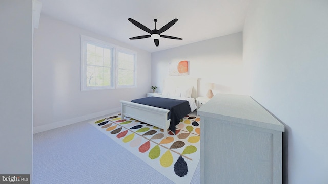 bedroom featuring ceiling fan and carpet