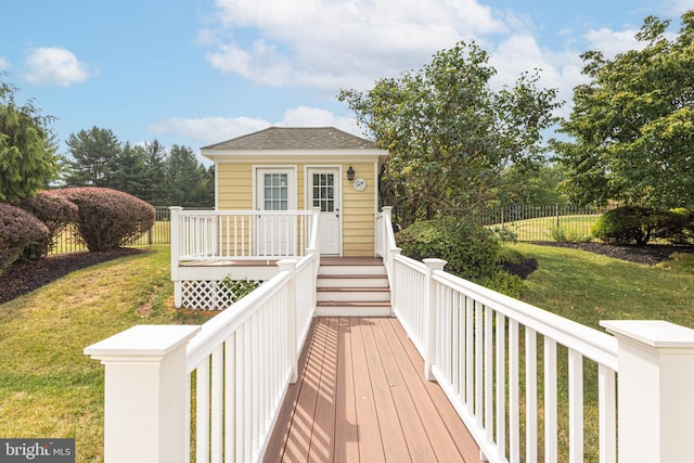 wooden deck with a yard