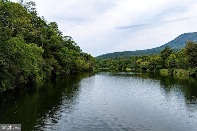 property view of water featuring a mountain view