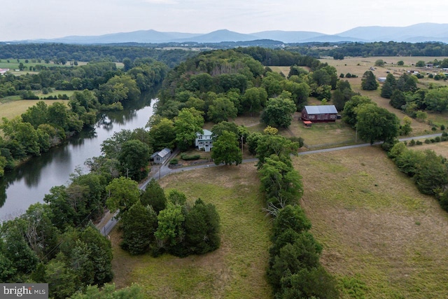 aerial view featuring a water and mountain view