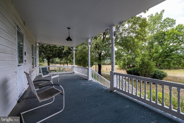 wooden terrace with covered porch