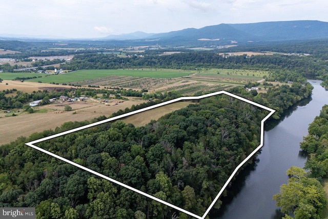 bird's eye view with a rural view and a water and mountain view