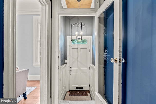 entryway with hardwood / wood-style flooring