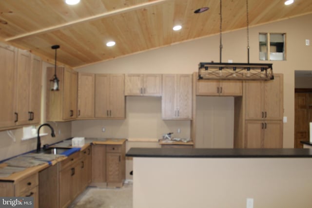 kitchen featuring wooden ceiling, decorative light fixtures, sink, lofted ceiling, and light brown cabinets