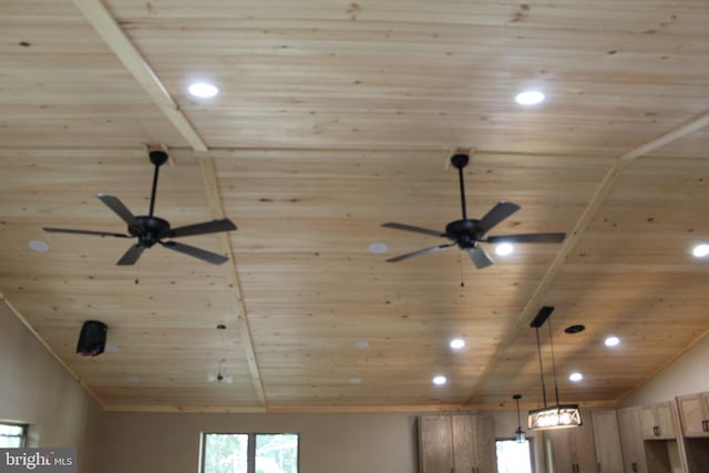 interior details with ceiling fan and wooden ceiling