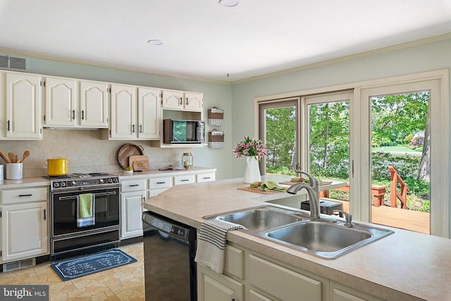 kitchen with sink, black appliances, ornamental molding, decorative backsplash, and white cabinets