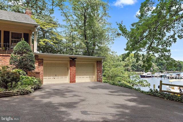 garage featuring a water view